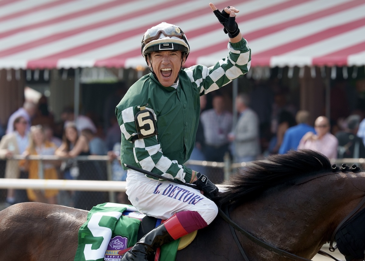 Metropolitan marvel: Frankie Dettori celebrates on Raging Torrent. Photo: NYRA / Joe Labozzetta
