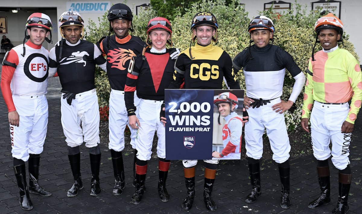 Career milestone: Flavien Prat with his colleagues at Aqueduct after hitting 2,000 wins. Photo: NYRA / Coglianese