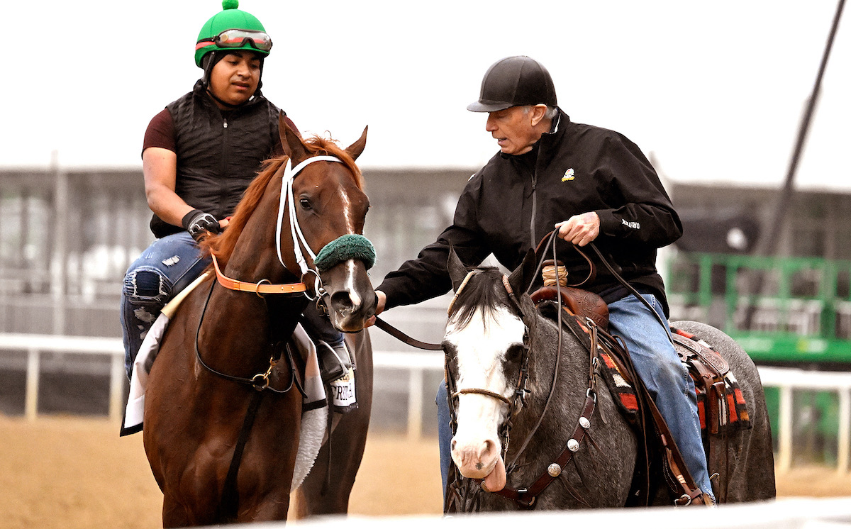 On the job: D Wayne Lukas with Kentucky Oaks winner Secret Oath at Pimlico. Photo: Maryland Jockey Club