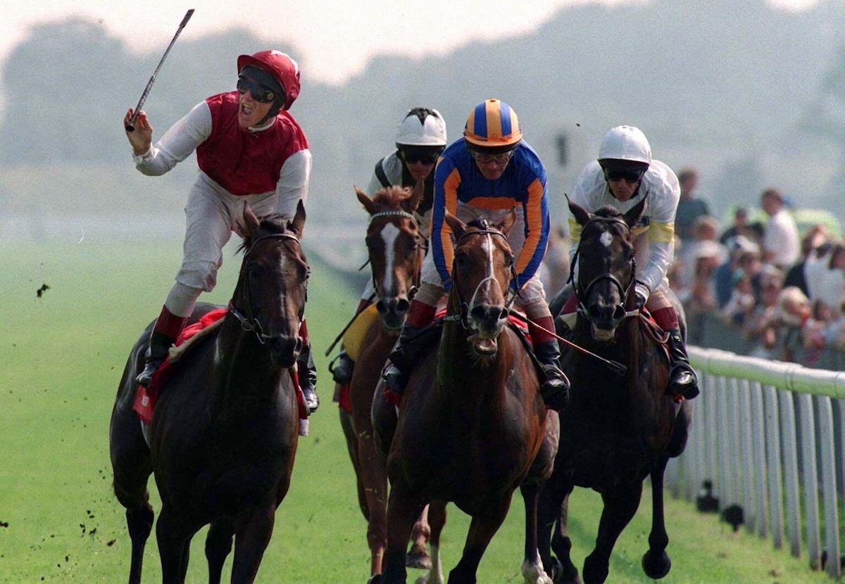 Frankie Dettori celebrates as Singspiel wins the Juddmonte International at York in 1997. Photo: Alamy Stock /John Giles (PA)