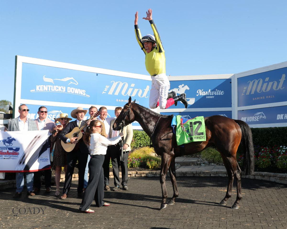 Flying dismount: Frankie Dettori in typical form after a rich success on Wimbledon Hawkeye. Photo: Coady Media / Renee Torbit