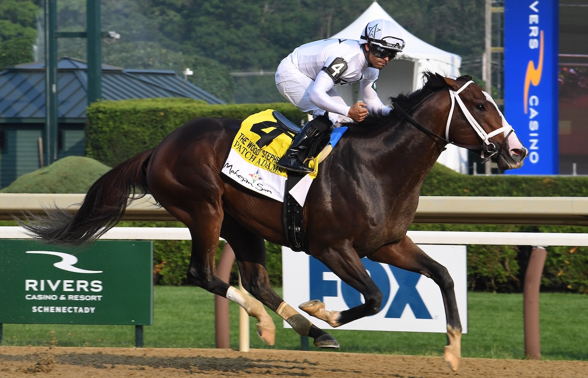 Patch Adams (Luis Saez) wins the G1 Woody Stephens at Saratoga. Photo: NYRA / Janet Napolitano