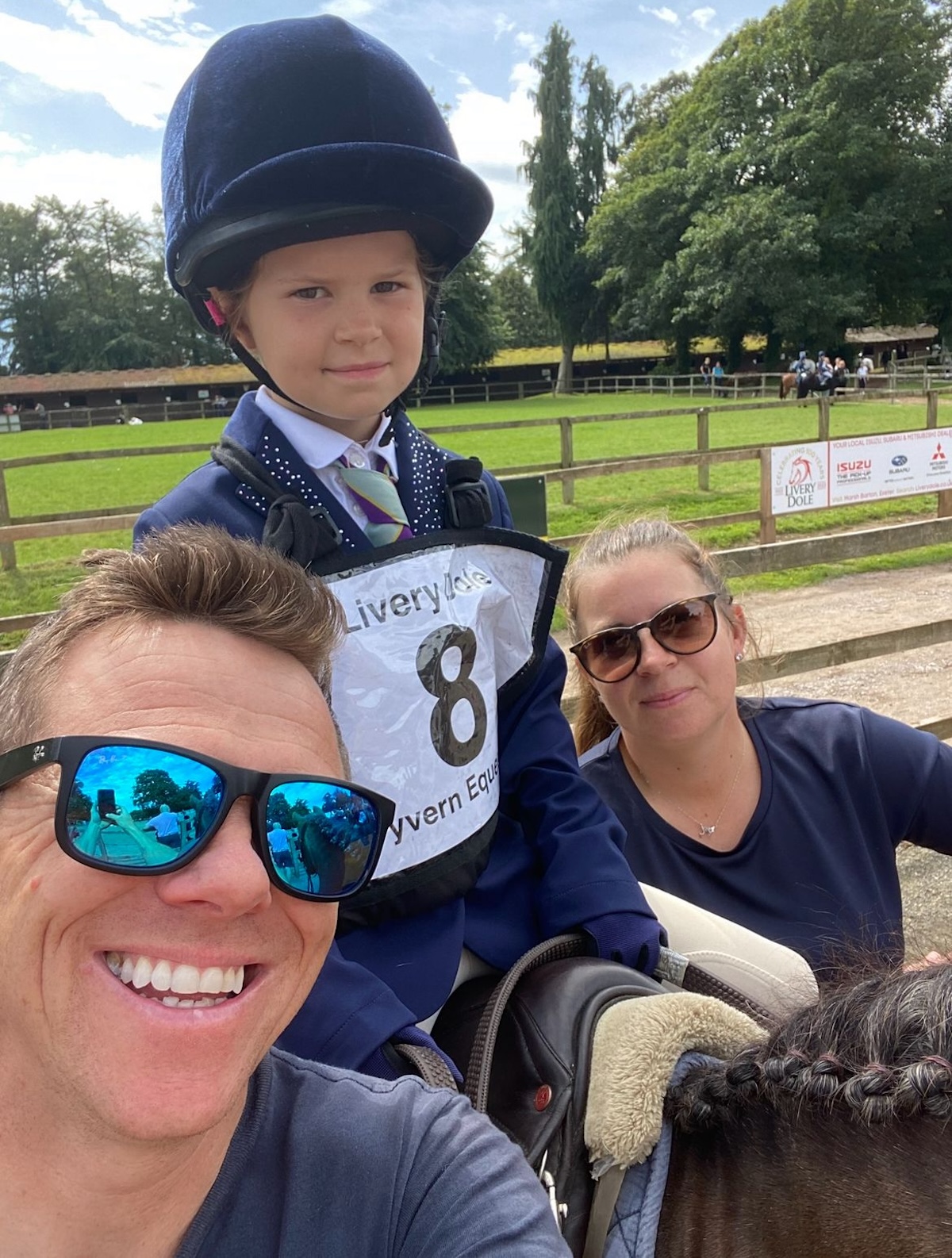 Family man: Mark Lawson at home with his wife Jess and daughter Isla. Photo supplied