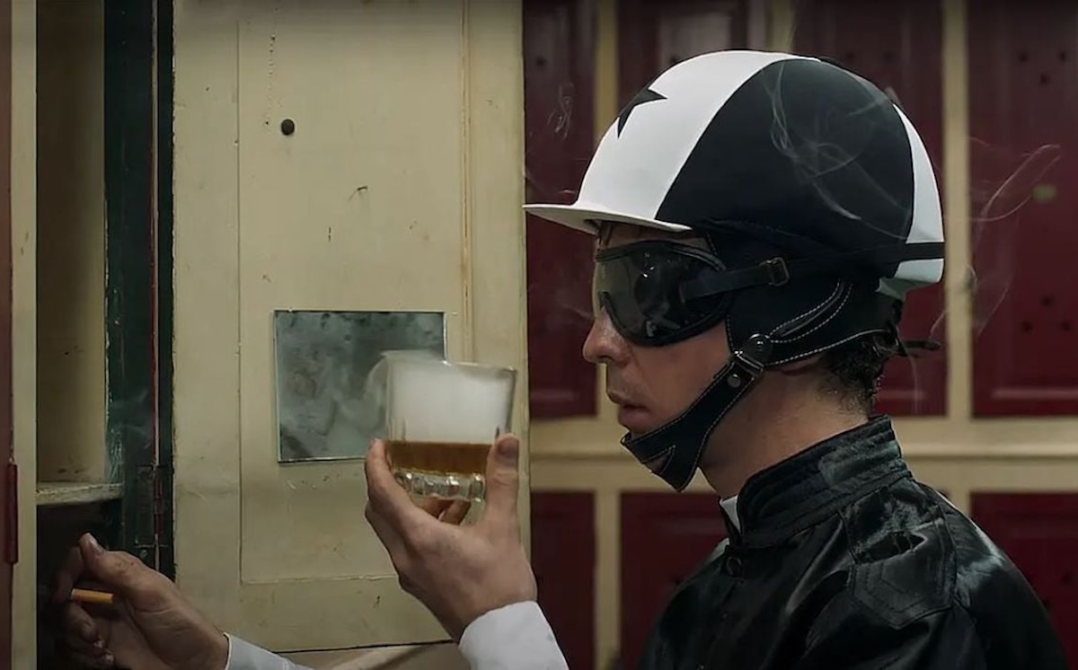 It takes a little extra something before veteran jockey Remo goes to work. Photo courtesy of REI Pictures