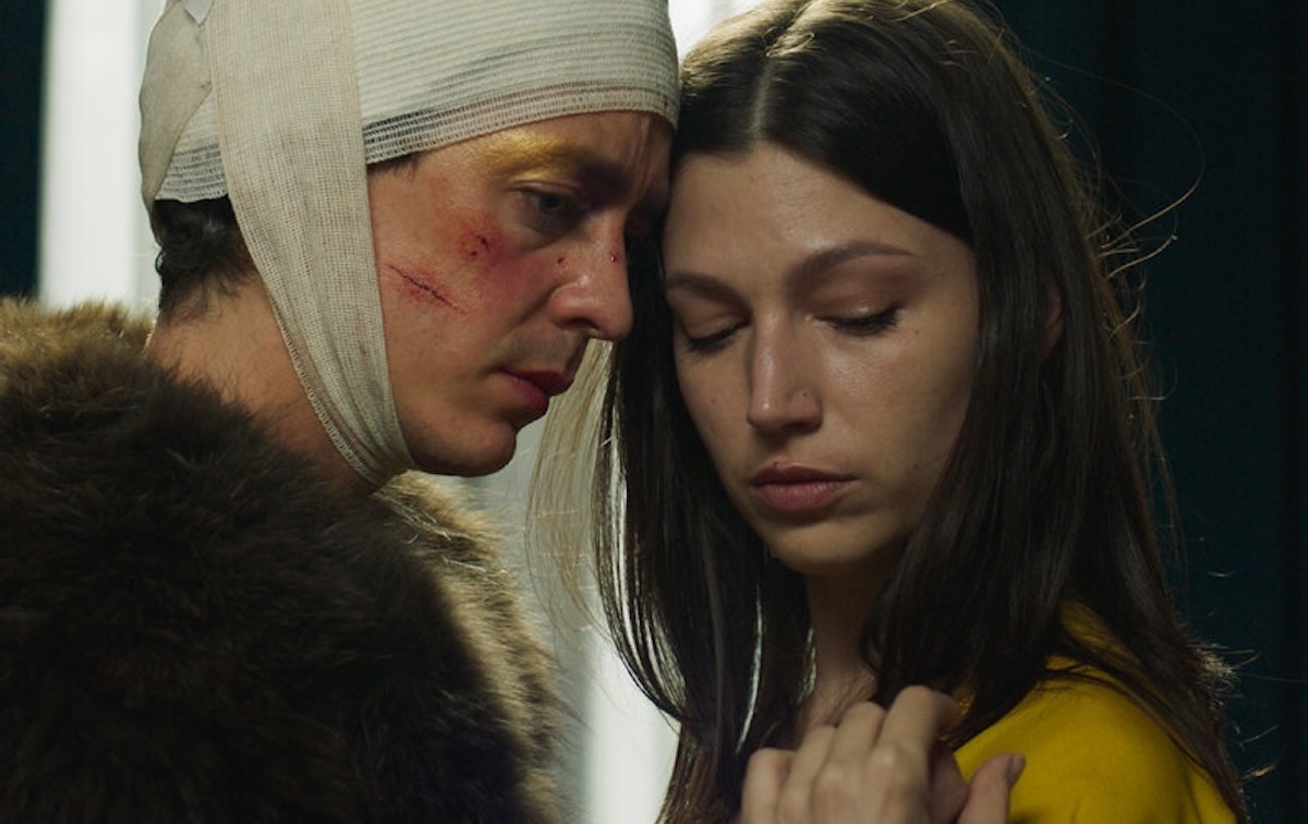 A battered and confounded Remo seeks comfort from Abril. Photo courtesy of REI Pictures