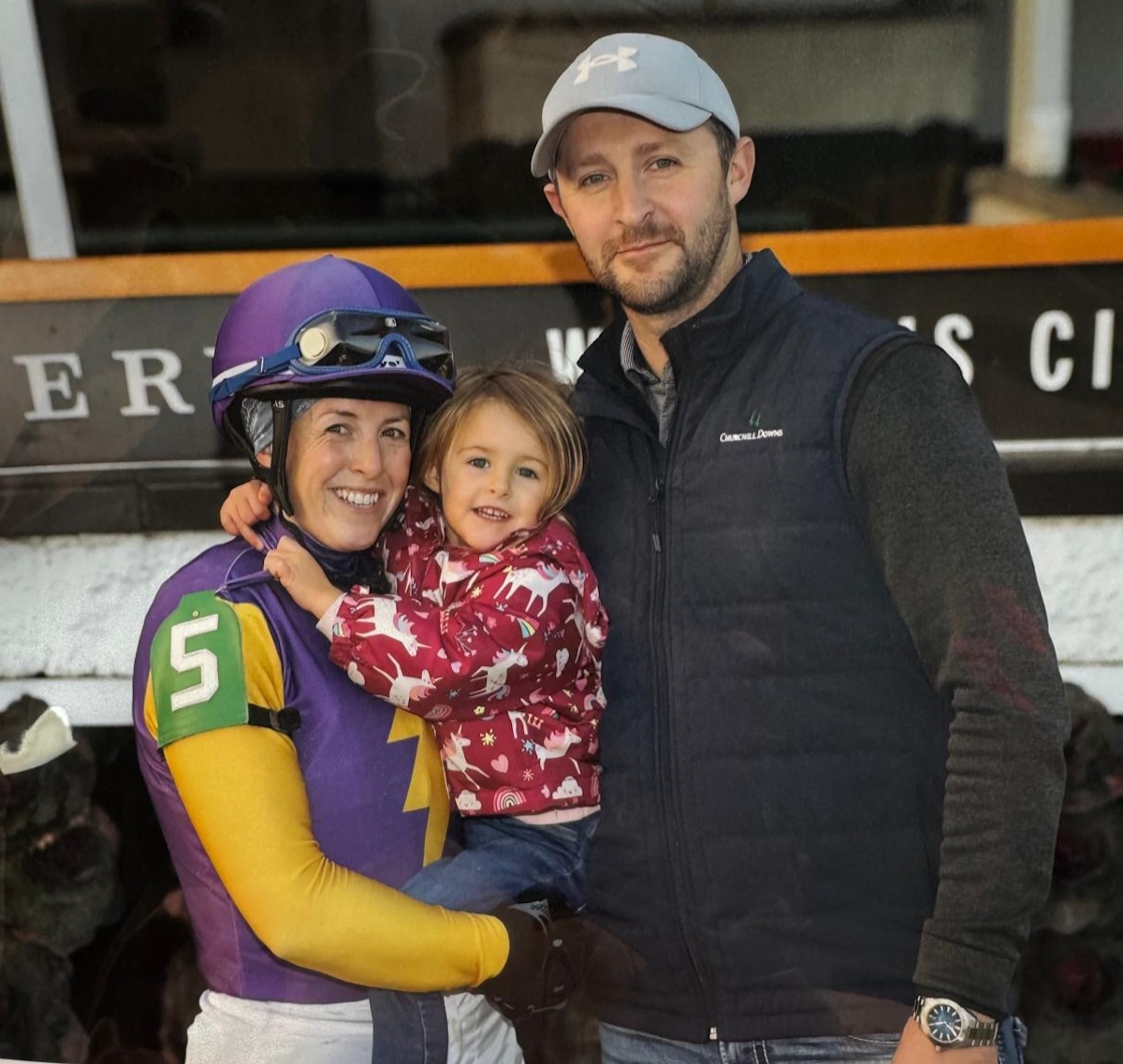 All in the family: Sophie Doyle with daughter Emilie and husband Christopher Davis after her final victory on Joejoe Go at Churchill Downs. Photo supplied