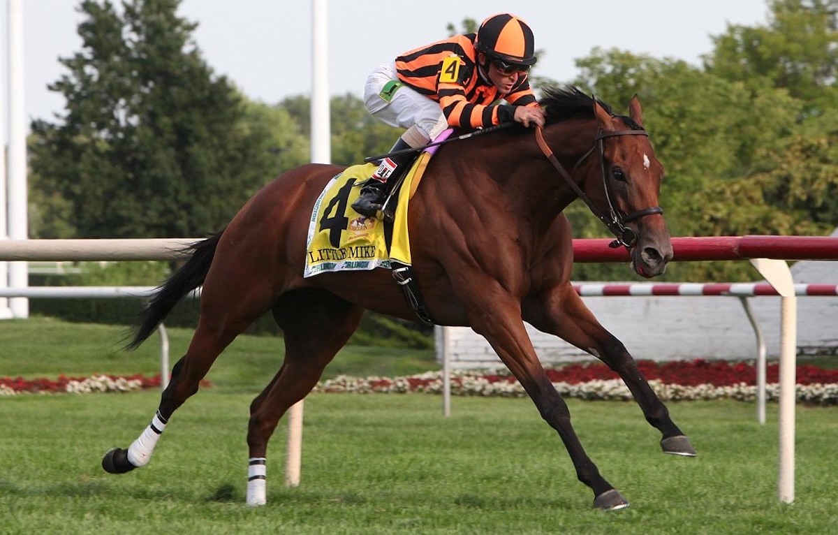 In their first collaboration, Ramon Dominguez and Little Mike click in the Arlington Million. (Arlington photo)