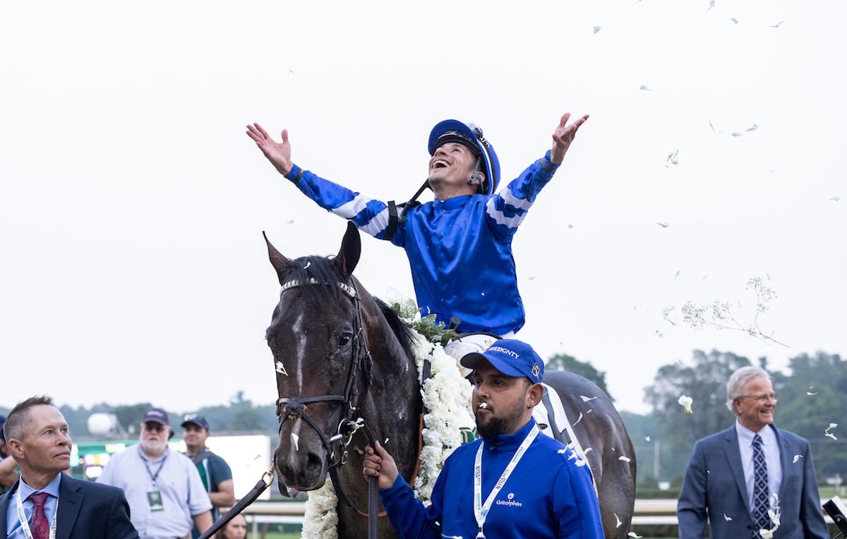 Junior Alvarado celebrates Sovereignty's triumph in the Belmont. Photo: NYRA / Walter Wlodarcyzk