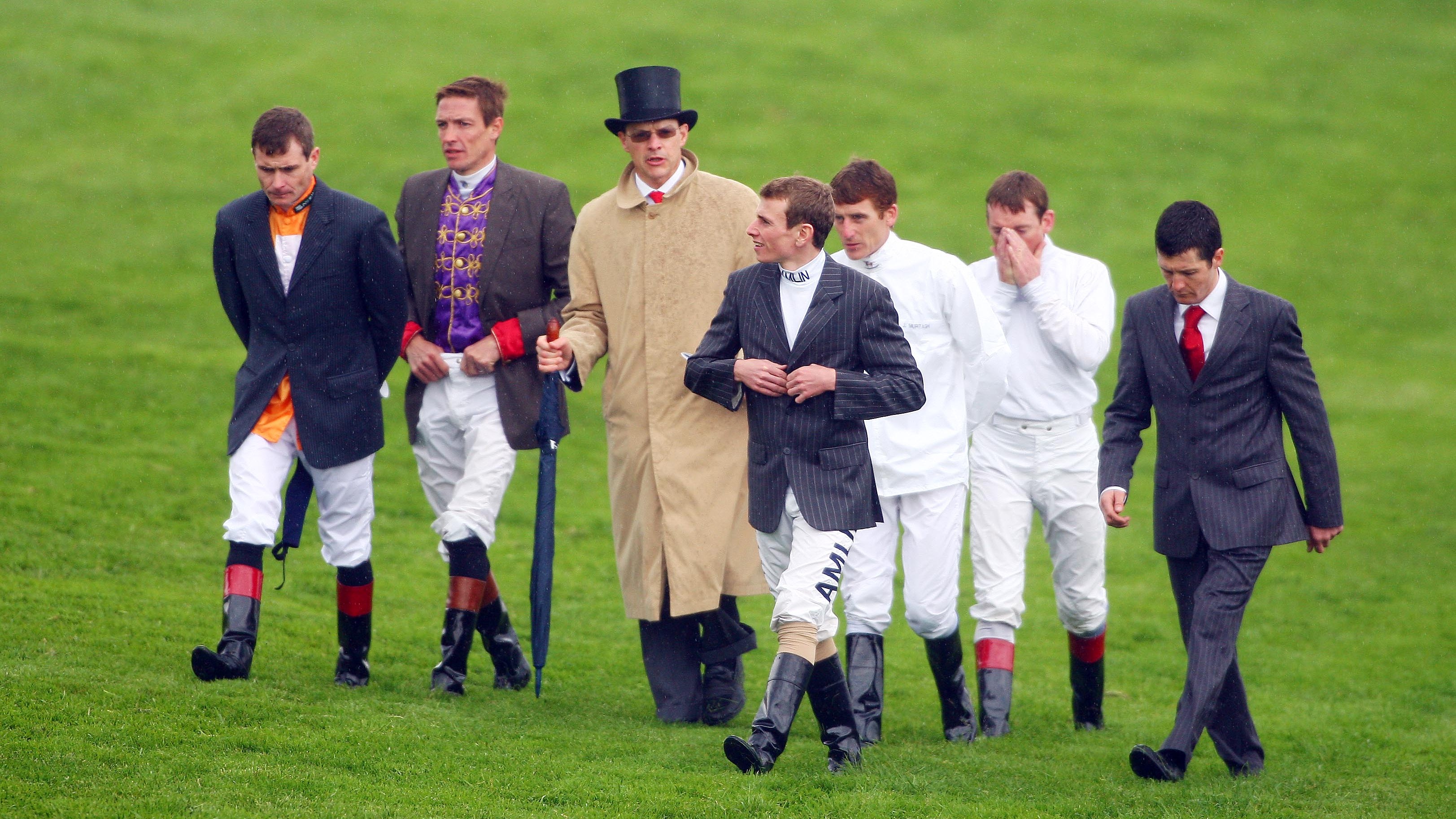 The riders of ‘Aidan's Army’... Colm O'Donoghue (suited on right) walks the course at Epsom in 2009. Photo: Focusonracing archive